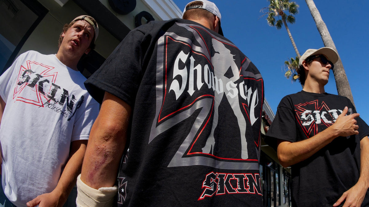Models wearing Skin Industries graphic T-shirts outdoors in Southern California