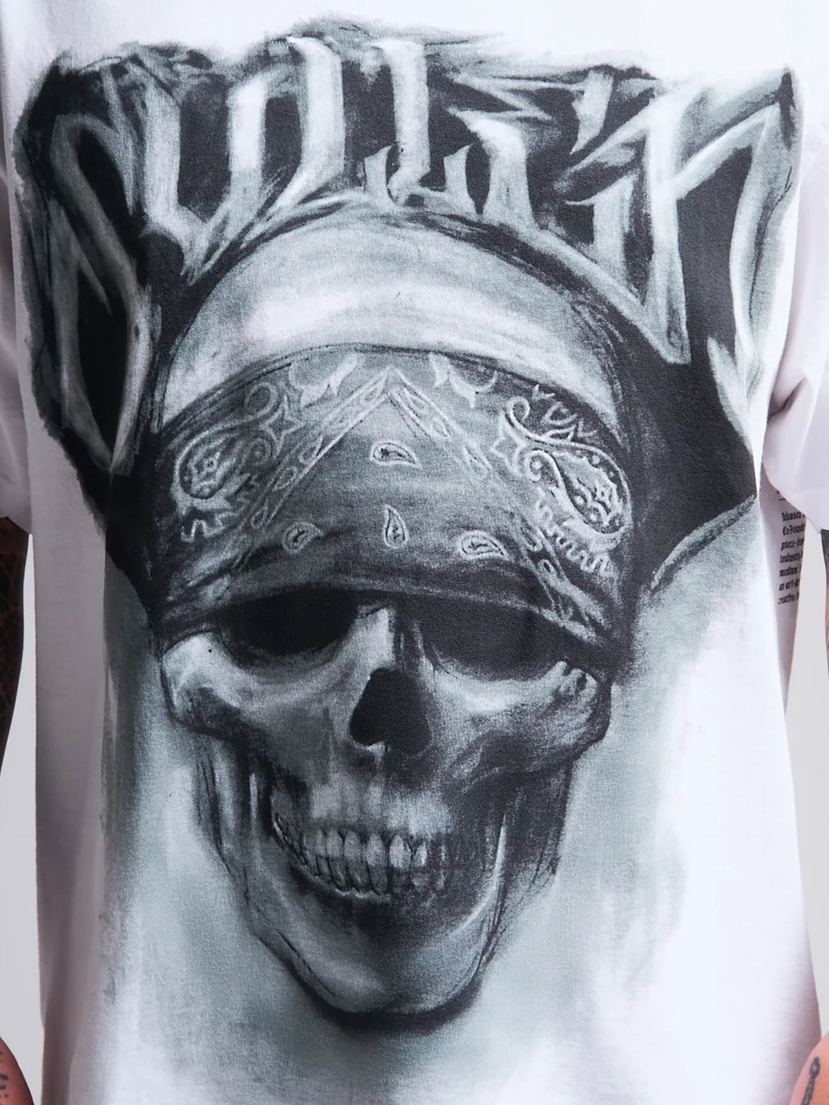 Close-up of charcoal skull graphic on White Sullen Bone Thug 1 Ton T-shirt