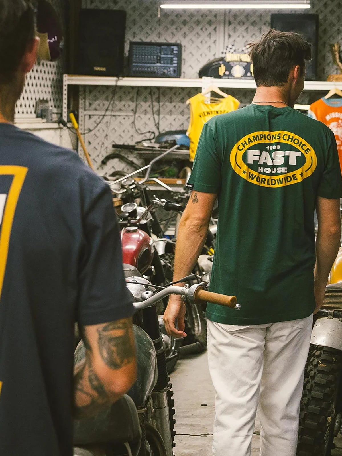 Fasthouse Men's Petrol Graphic T-shirt in Forest Green, alternate lifestyle view showing the back graphic