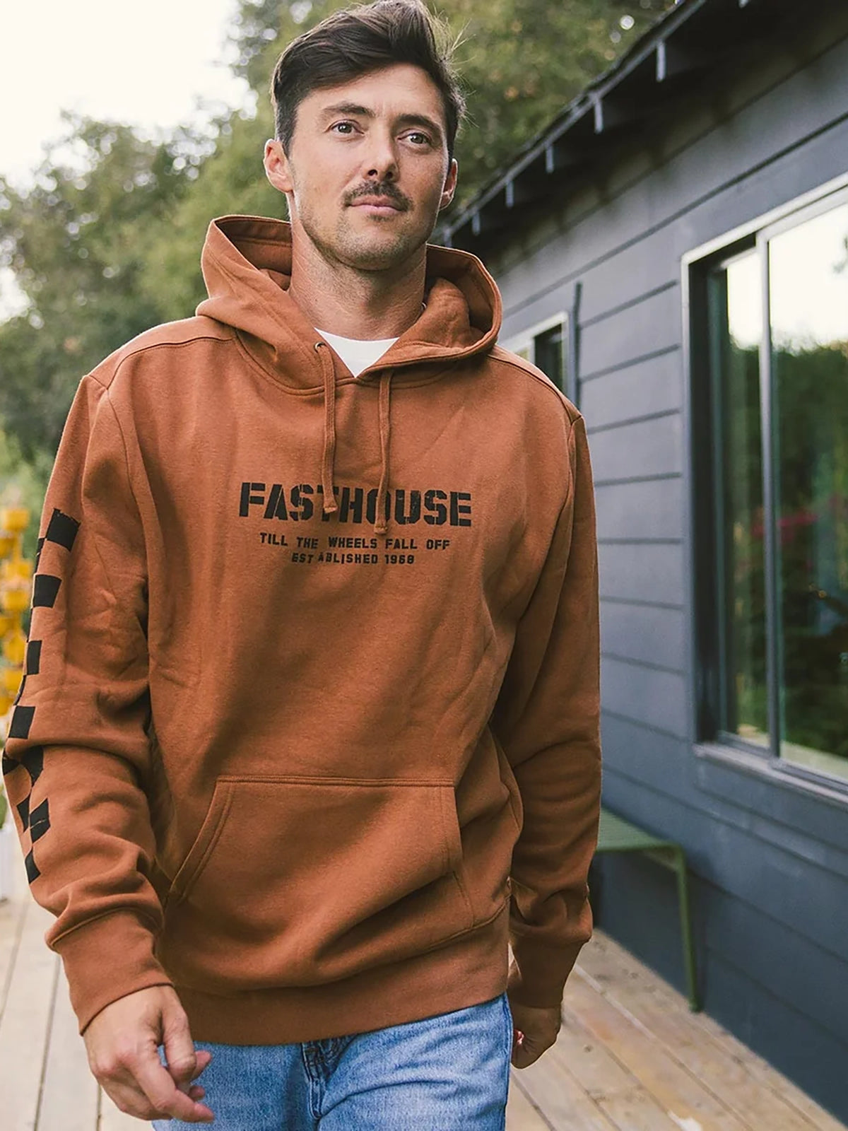 Fasthouse Men's Torn Pullover Hoodie in Rust, alternate front lifestyle view