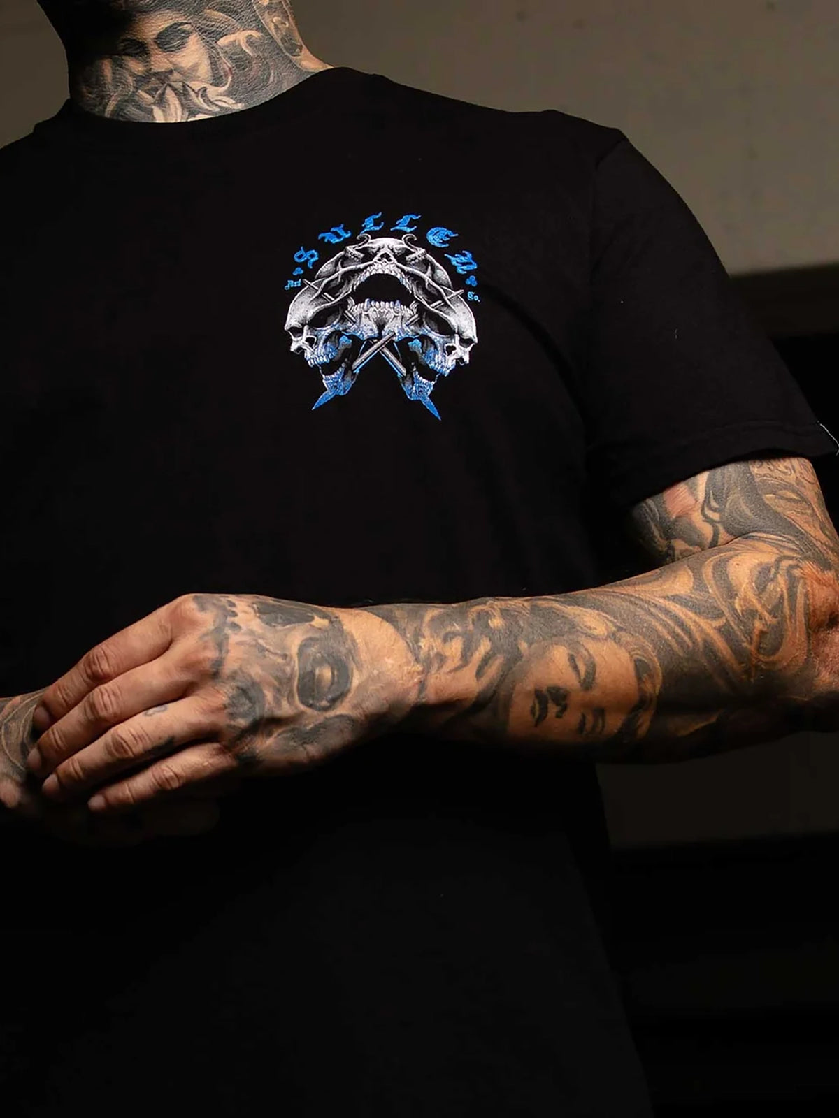 Model wearing the front of the Sullen Triple Threat Premium T-shirt in Jet Black