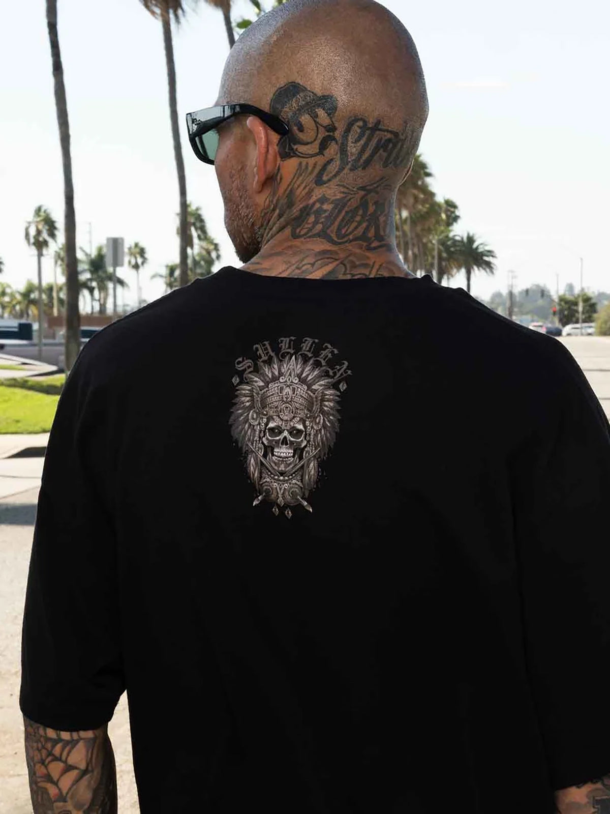 Model wearing the back of the Sullen Warrior Standard T-shirt in black