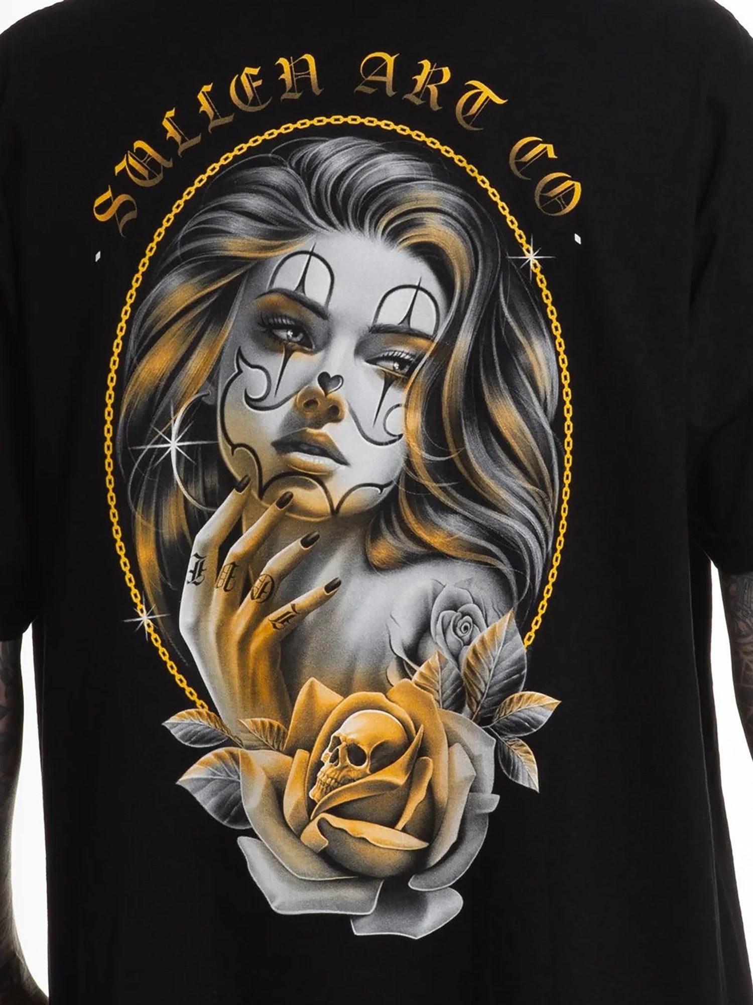 Close-up of Sullen Gold Gaze 1 Ton T-shirt back artwork