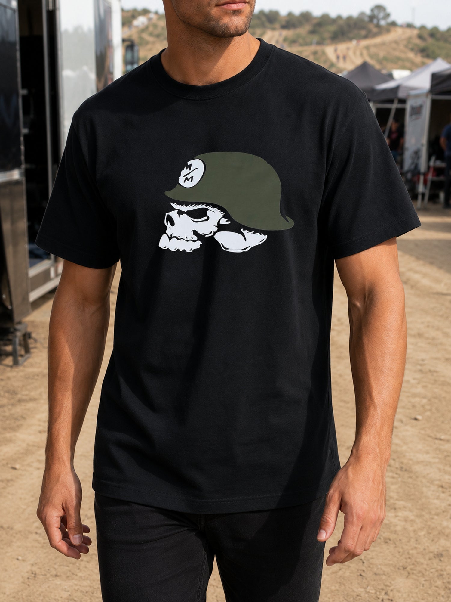 Metal Mulisha OG Helmet black T-shirt worn in a motocross race paddock