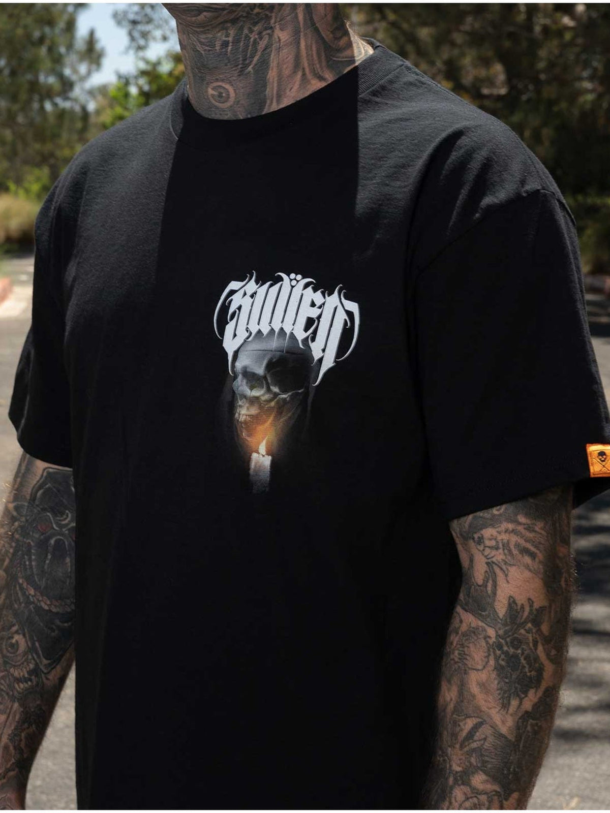 Styled front view of the Sullen Last Light Standard black T-shirt with small chest graphic