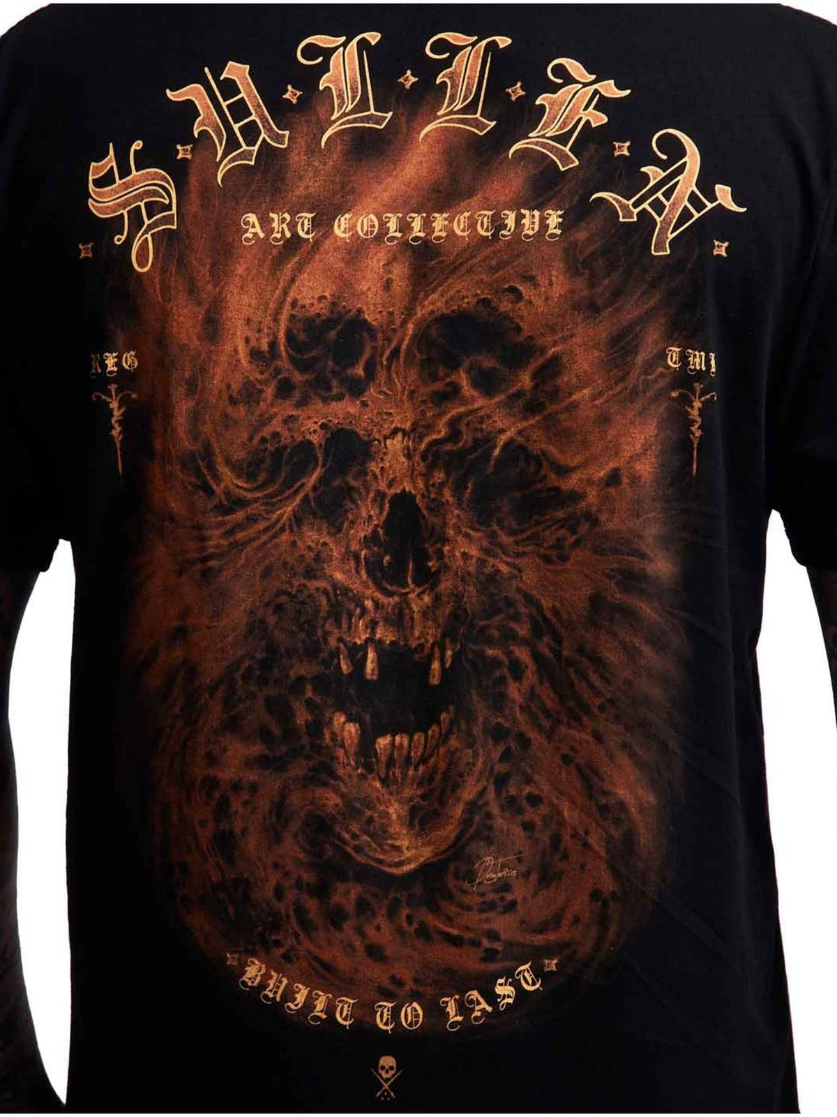 Close-up of the Revenant fiery skull and vintage tattoo-lettering back artwork