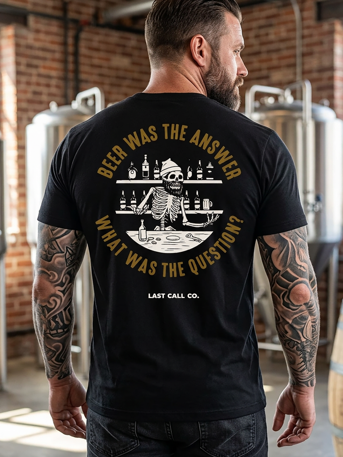 Last Call Co Answer Graphic T-Shirt Black lifestyle back view featuring skeletal hand holding a telephone and Death May Be Calling back graphic