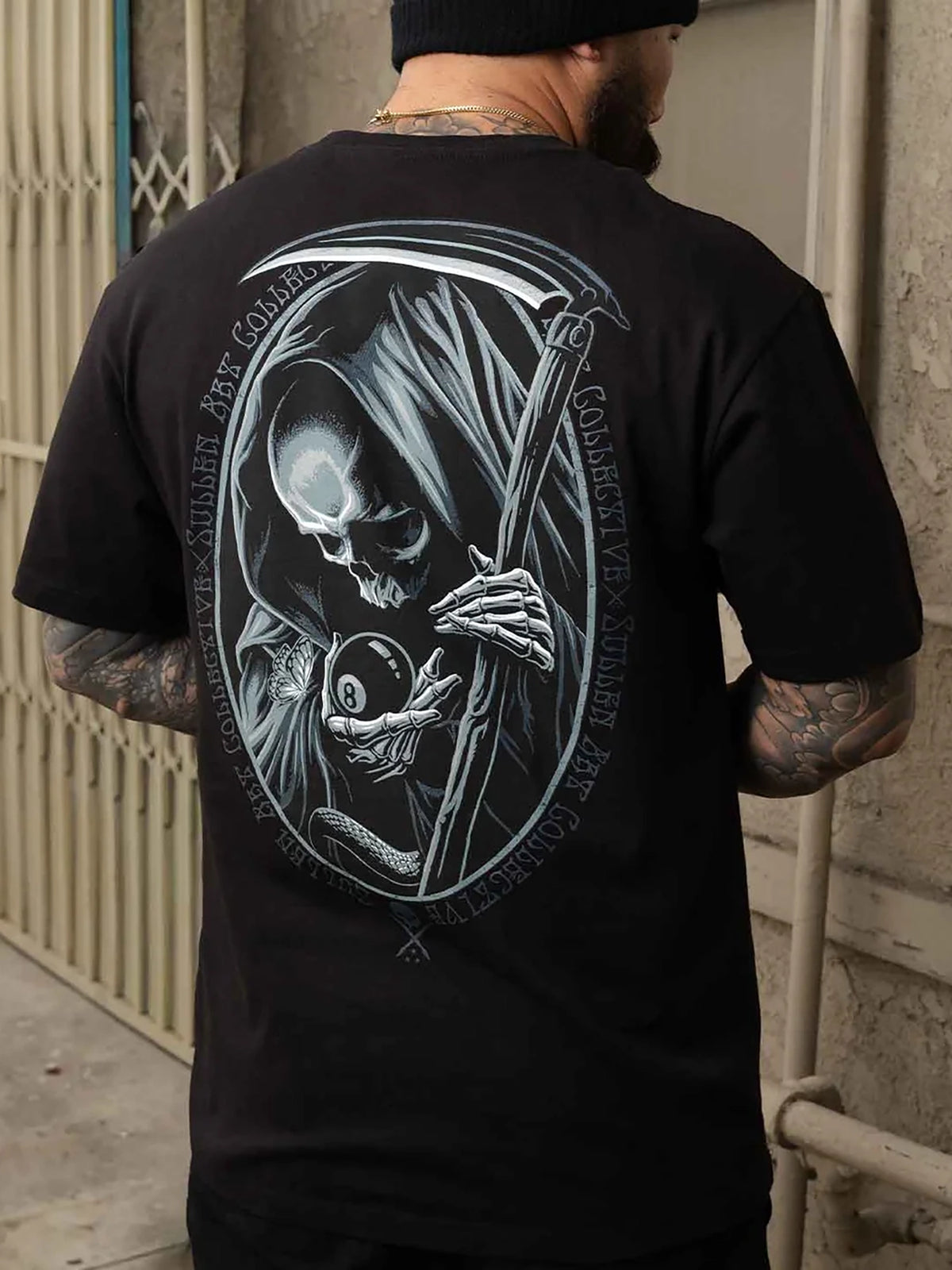 Model wearing the back of the Sullen Behind the 8 Standard T-shirt in black