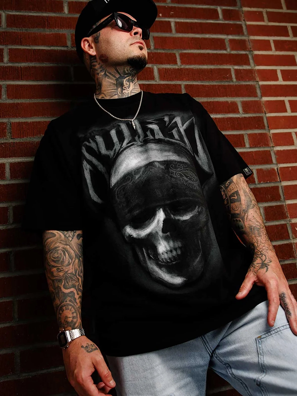 Male model wearing Jet Black Sullen Bone Thug 1 Ton T-shirt - front view