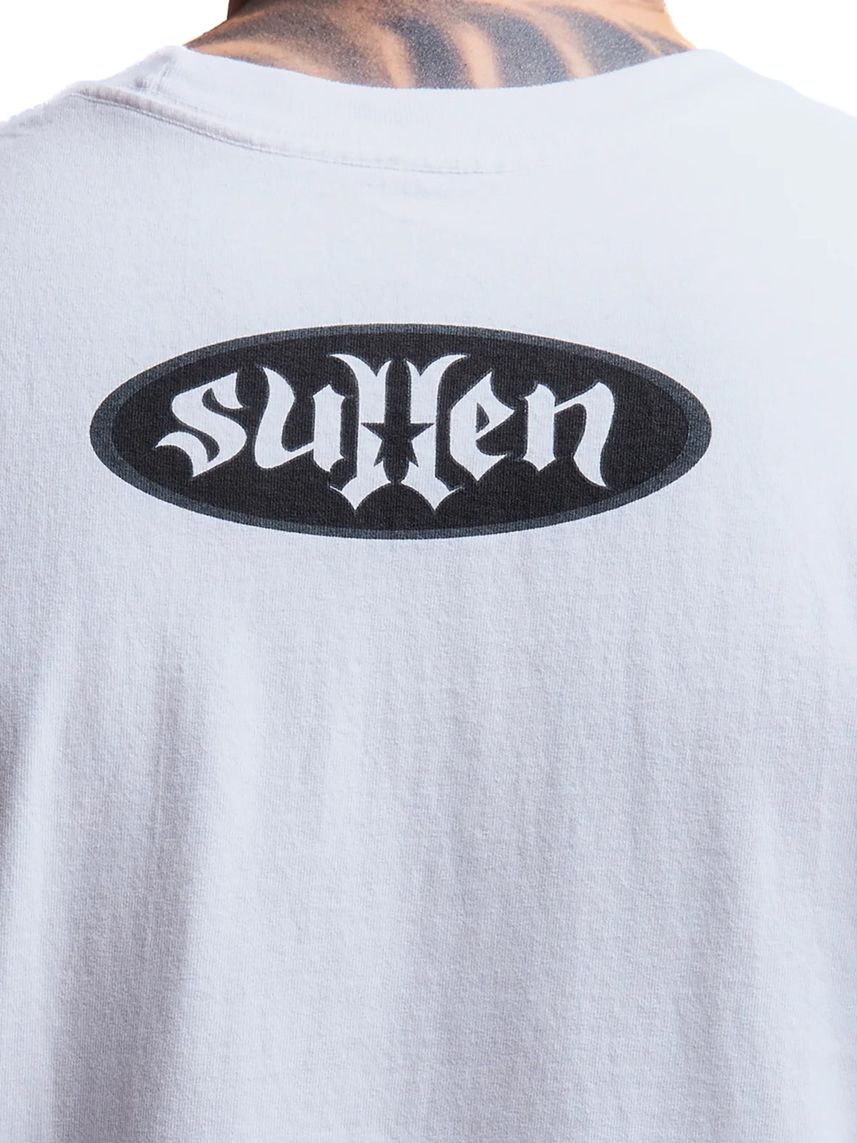 Close-up of small Sullen back graphic on White Bone Thug 1 Ton T-shirt