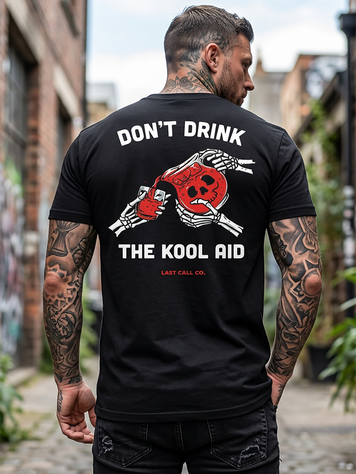 Last Call Co Don't Drink Graphic T-Shirt Black lifestyle back view featuring skeleton drinking from a bottle and Don't Drink So Much Today back graphic
