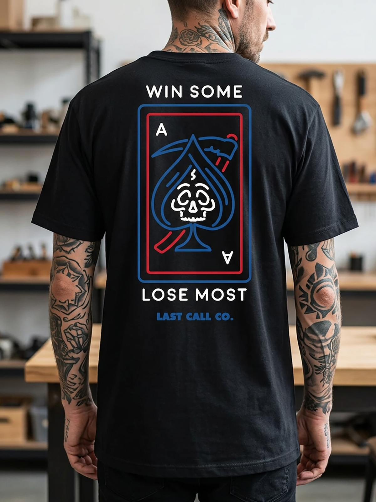 Last Call Co Lose Most Graphic T-Shirt Black lifestyle back view featuring skeletal hand rolling dice and You Win Some You Lose Most back graphic