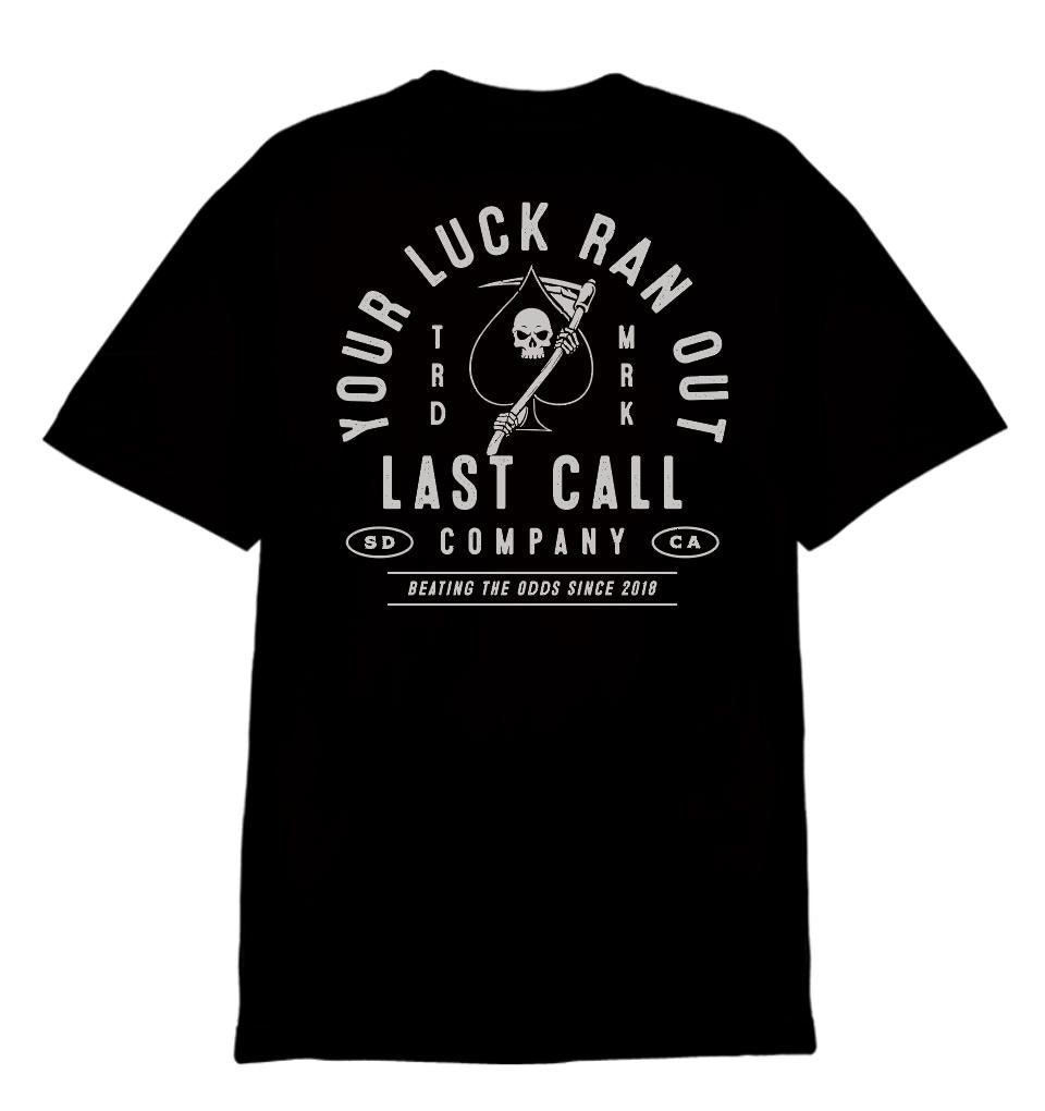 Last Call Co Luck Badge Graphic T-shirt in Black, back view with skull, horseshoes and Your Luck Ran Out artwork