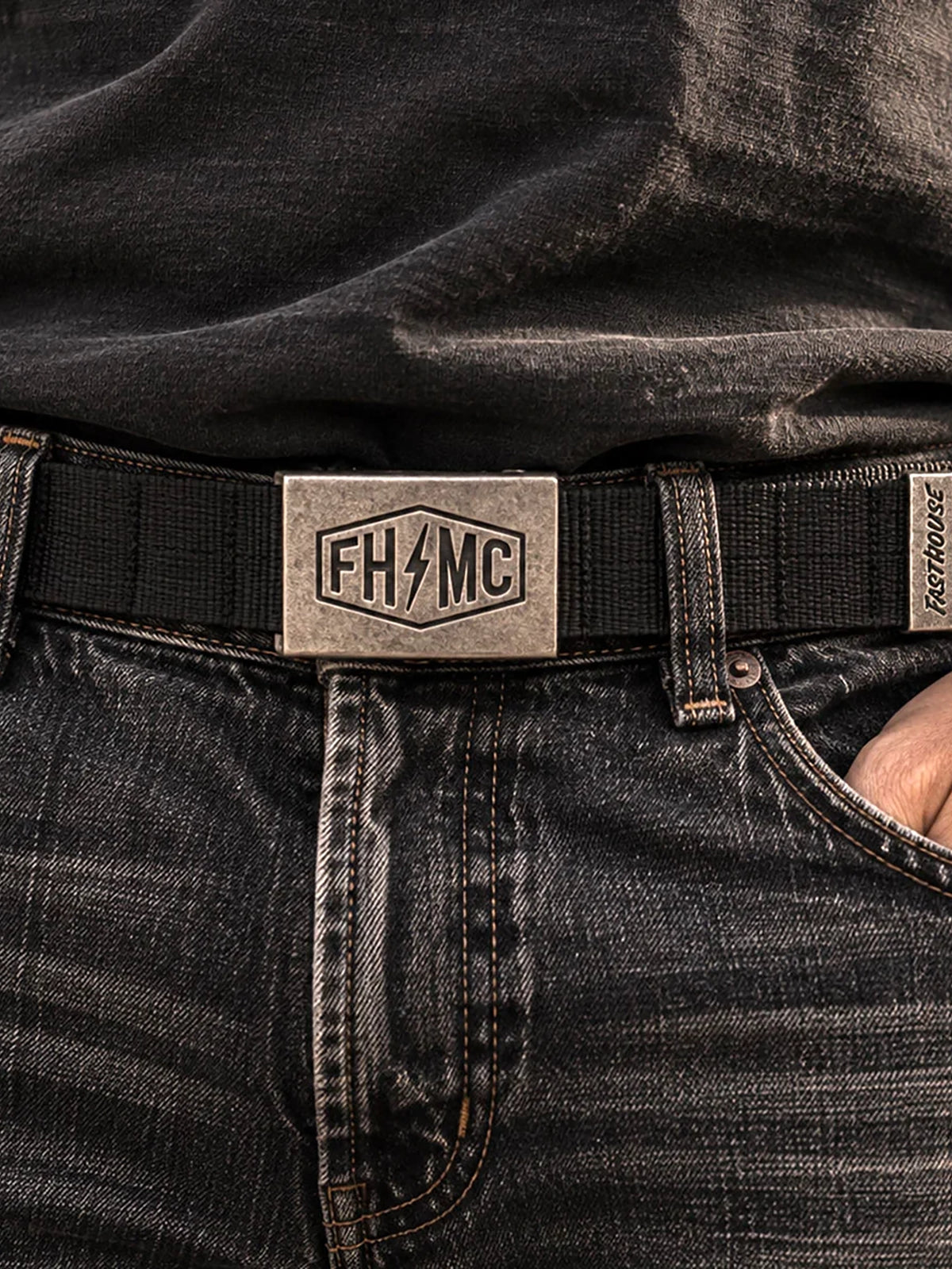 Close-up of black Fasthouse Rapid Stretch Belt woven stretch material