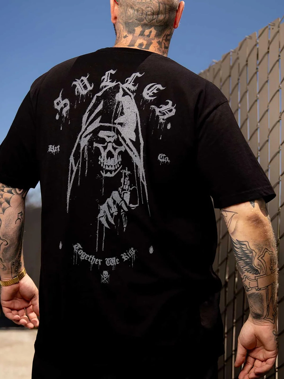 Model wearing the back of the Sullen Sprayed Premium T-shirt in Jet Black