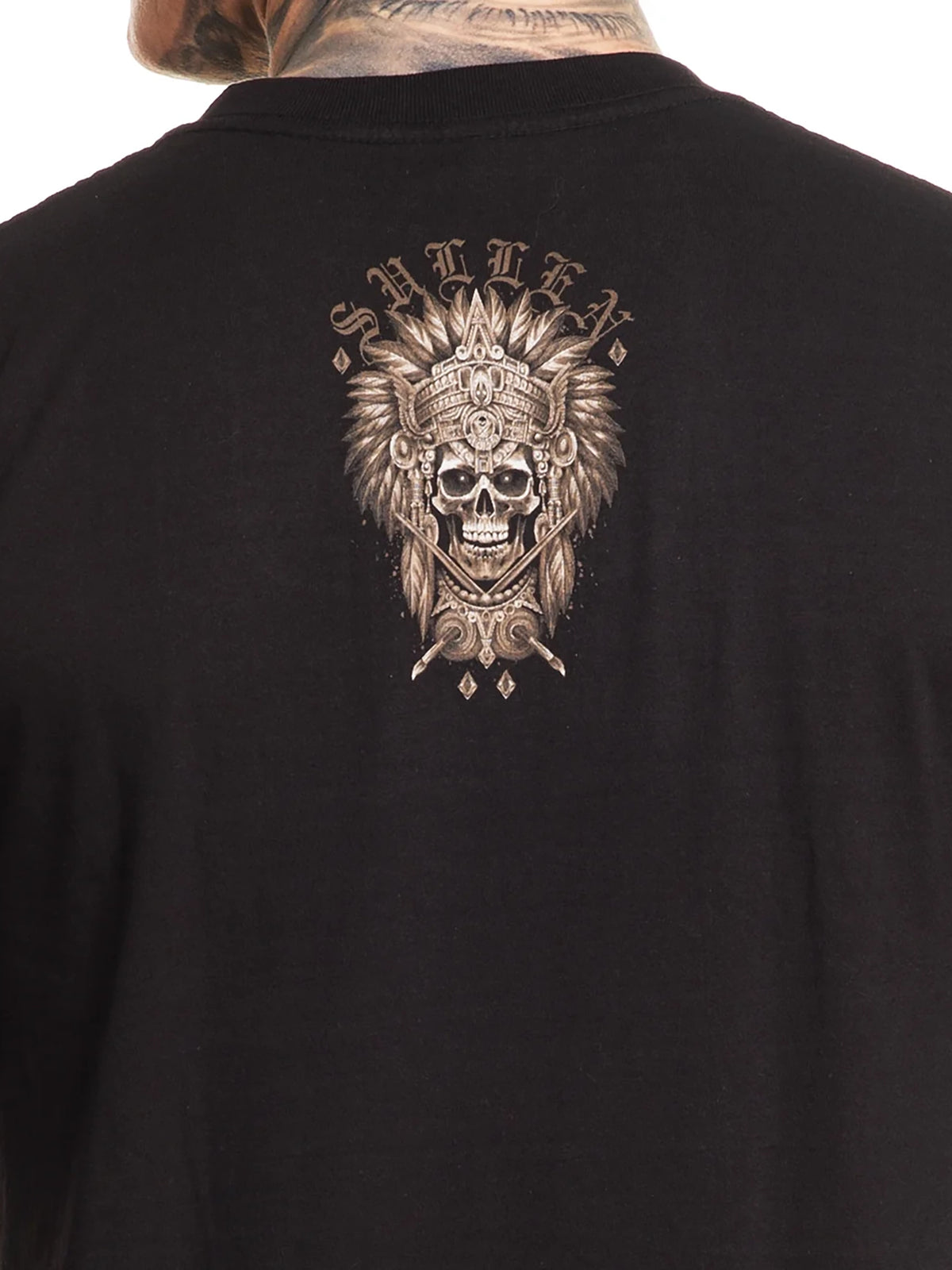 Close-up of the small warrior mask back graphic on the Sullen Warrior T-shirt