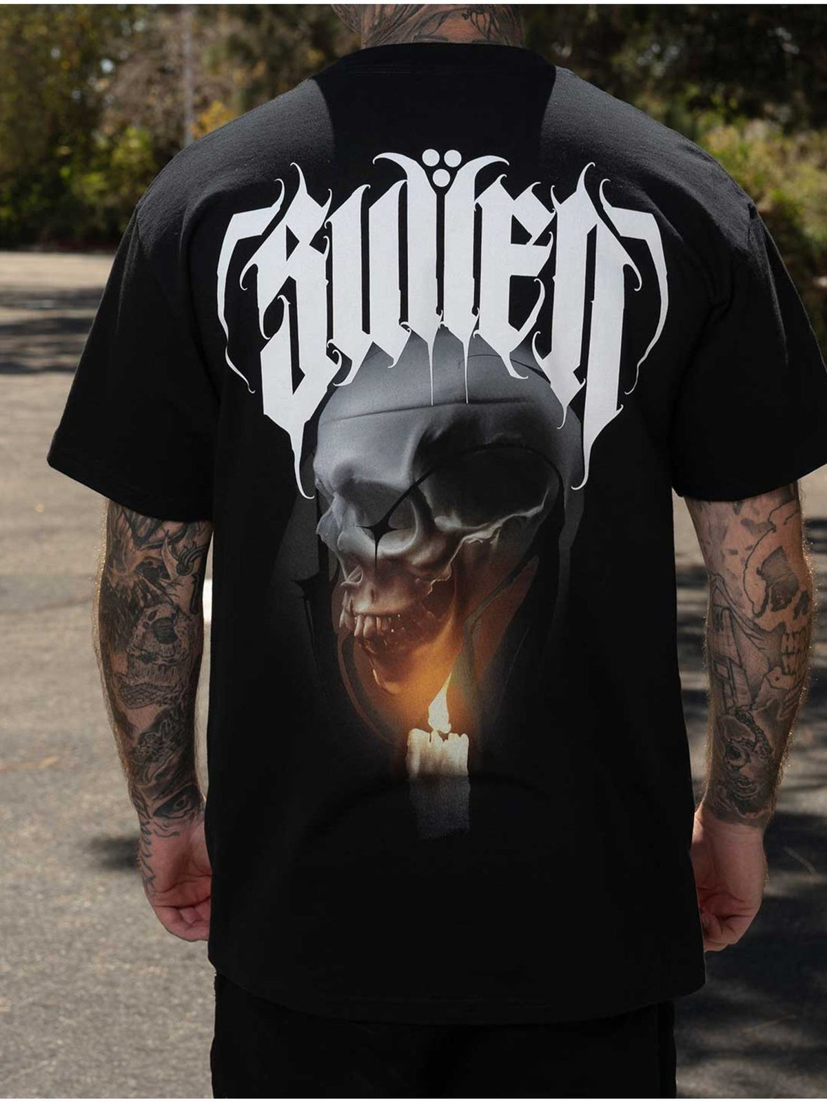 Styled back view of the Sullen Last Light Standard black T-shirt with hooded skull and candle artwork
