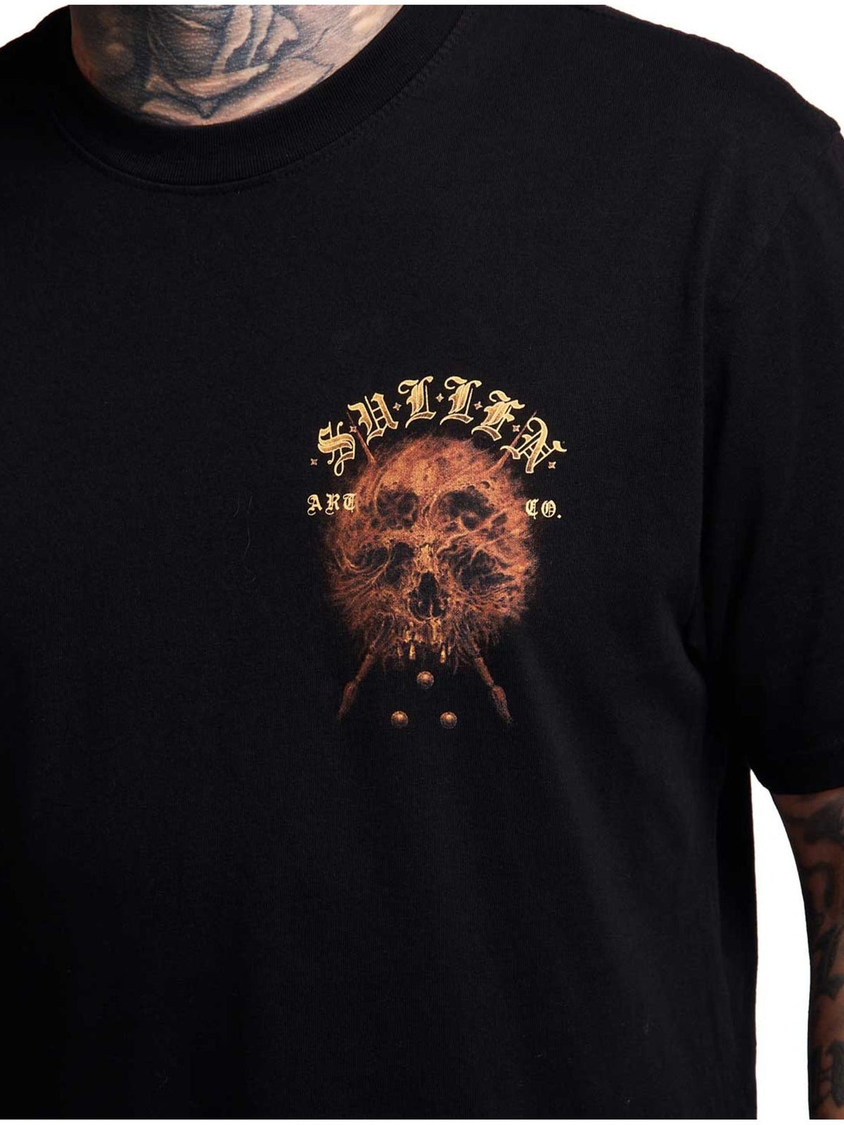 Close-up of the small Revenant skull chest graphic on Jet Black cotton