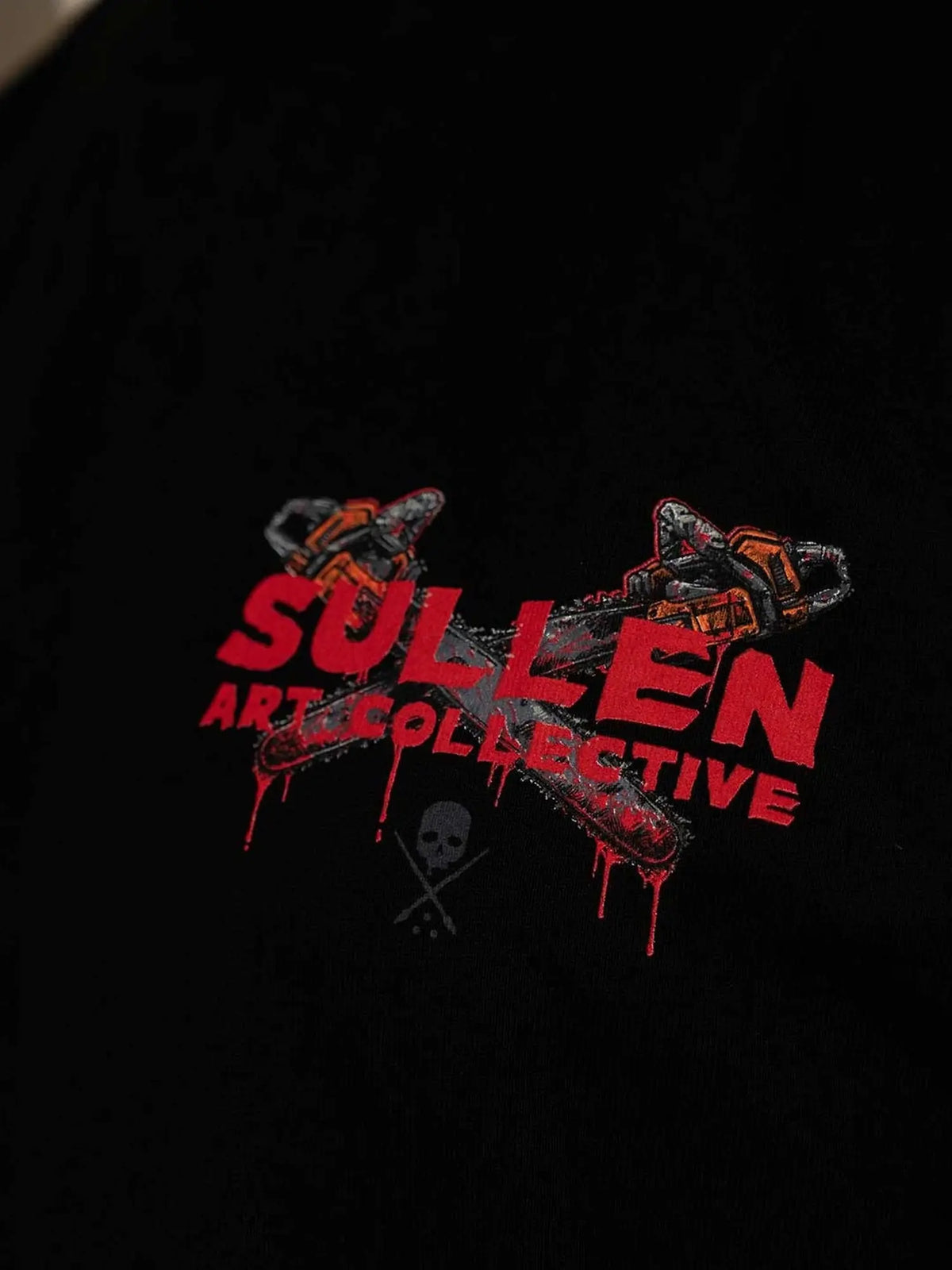 Styled front detail of the Sullen Chainsaw Badge 1 Ton T-shirt