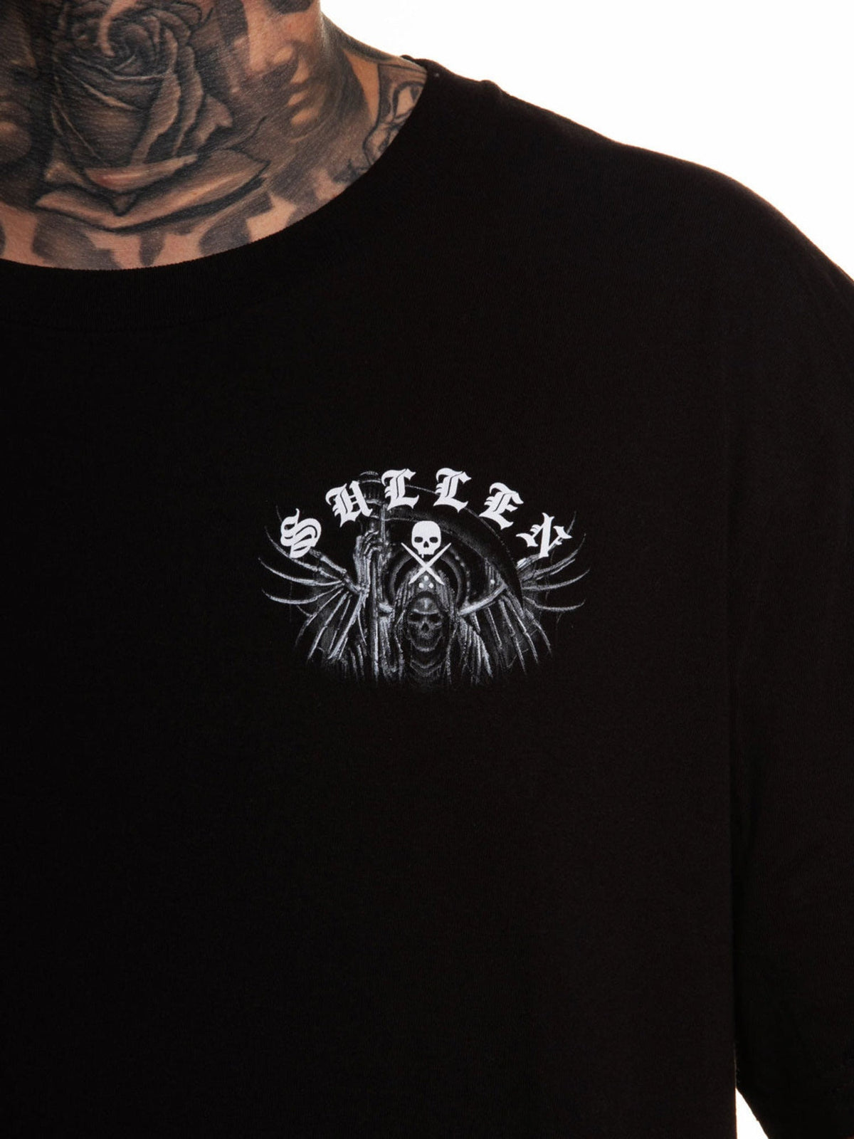 Close-up of the small HODU reaper left-chest graphic on the Sullen premium tee