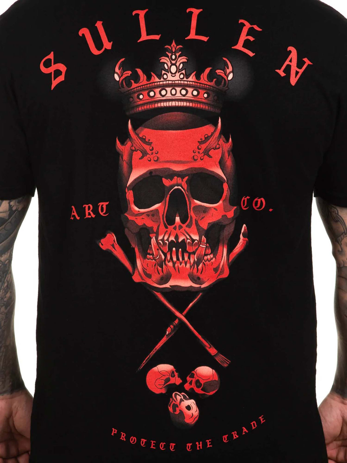 Close-up of dark red Sullen badge artwork on the Fires Premium T-shirt
